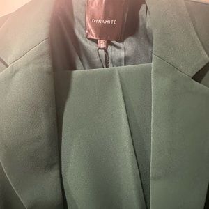 Dynamite suit - green never worn. I don’t love how dynamite fits.